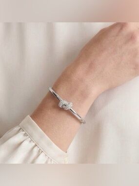 Kate Spade New York Loves Me Knot Pave Hinged Bangle Bracelet Silver Tone